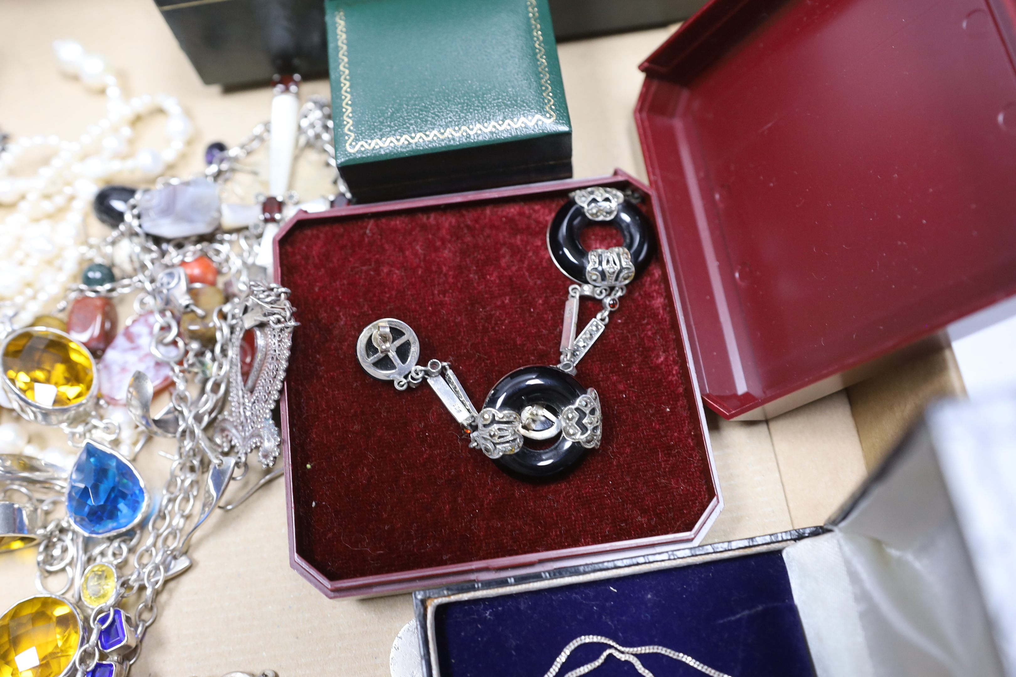 A quantity of assorted silver, 925, white metal and other jewellery including torque necklace, cross pendant necklace, marcasite and onyx set drop earrings, enamelled cross brooch, bangle, medals, dress rings, freshwater